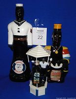Front view of all three decanters showing labels and figures