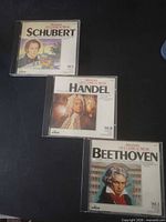 Front covers of three CDs showing composers and volume numbers