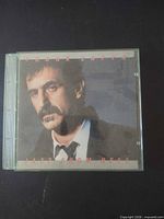 Front of jewel case showing cover art and artist/album title