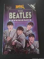 Front cover of Part Two showcasing title, series branding, Beatles illustration, facsimile signatures