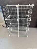 Front view of assembled six-cube white wire shelving