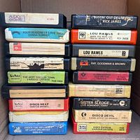 Front view of stacked 8-tracks showing artist and album labels