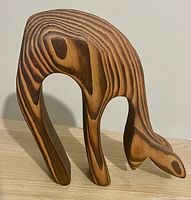 Left side profile of layered wood deer figure