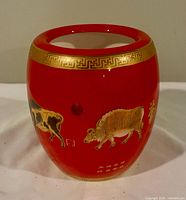 Front view showing ox illustration and gold rim pattern