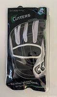 Front of unopened package showing gloves design and branding