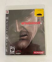 Front of PS3 case showing title, artwork, ESRB rating, publisher