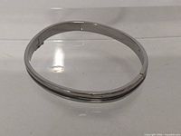 Full view of sterling silver hinged bangle bracelet
