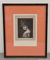 Full view of framed etching with mat and frame