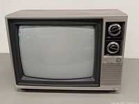 Front view of Concerto CRT television showing screen, control panel and logo