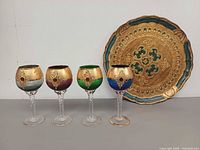 Front view of tray and four goblets
