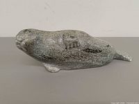 Left side view of soapstone seal sculpture
