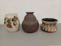 Group shot of all three vases front view