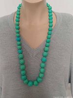 Necklace worn on mannequin showing bead size and overall drop