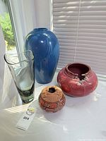 Group shot of all four vases on tabletop