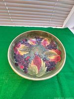 Top view of Moorcroft bowl showing full fruit pattern interior