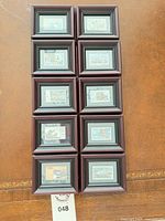 Full view of all 10 framed stamps arranged in two columns of five
