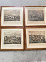 All four framed engravings laid out