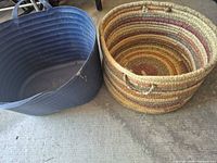Blue plastic tub and woven basket side by side