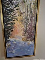 Full view of framed vertical oil painting