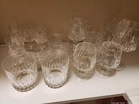 Assorted cut-crystal tumblers and goblets