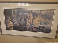 Full framed print on wall showing artwork, mat and frame