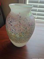 Full view of vase showing shape and multicolour speckled design