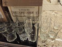 cluster of varied clear drinking glasses