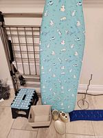 All items group shot with drying rack, ironing board, step stool, storage bin, trays, stand