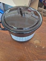 Stock pot with lid showing exterior color and pattern