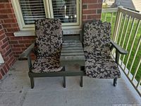 Front view of bench showing both seats, center table, and cushions