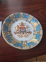 Front view showing full plate design and size reference