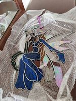 Full view of stained glass fairy panel on bubble wrap