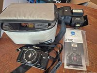 Camera, flash, bag, manuals overview