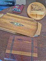 Overview of four wood items on table