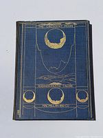 Front cover showing title, author and gilt design