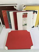 All cutting board sets displayed, showing colors, frames and packaging