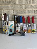 Group shot of all unopened Microplane graters standing and lying on table