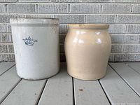 Both crocks side by side on porch