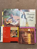 Group shot of Francoise Hardy and poetry record covers