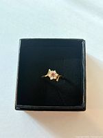 Ring in presentation box, full view