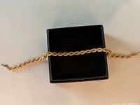 Bracelet displayed across black box