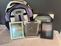 Front view showing backpack and four frames