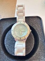 Top view of white Mickey Mouse watch seated in foam insert