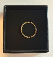 Ring in presentation box showing full circular form