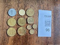 All tokens laid out showing fronts and relative sizes