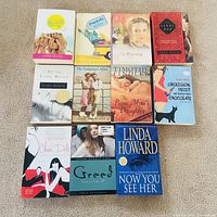 All eleven novels laid out in three rows