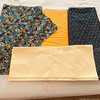 All four fabric pieces laid out together