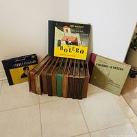 Group shot showing binders and three boxed albums