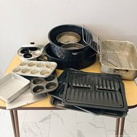 Group shot of all bakeware items on table