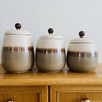 Front view of three Beauceware Yukon canisters with lids